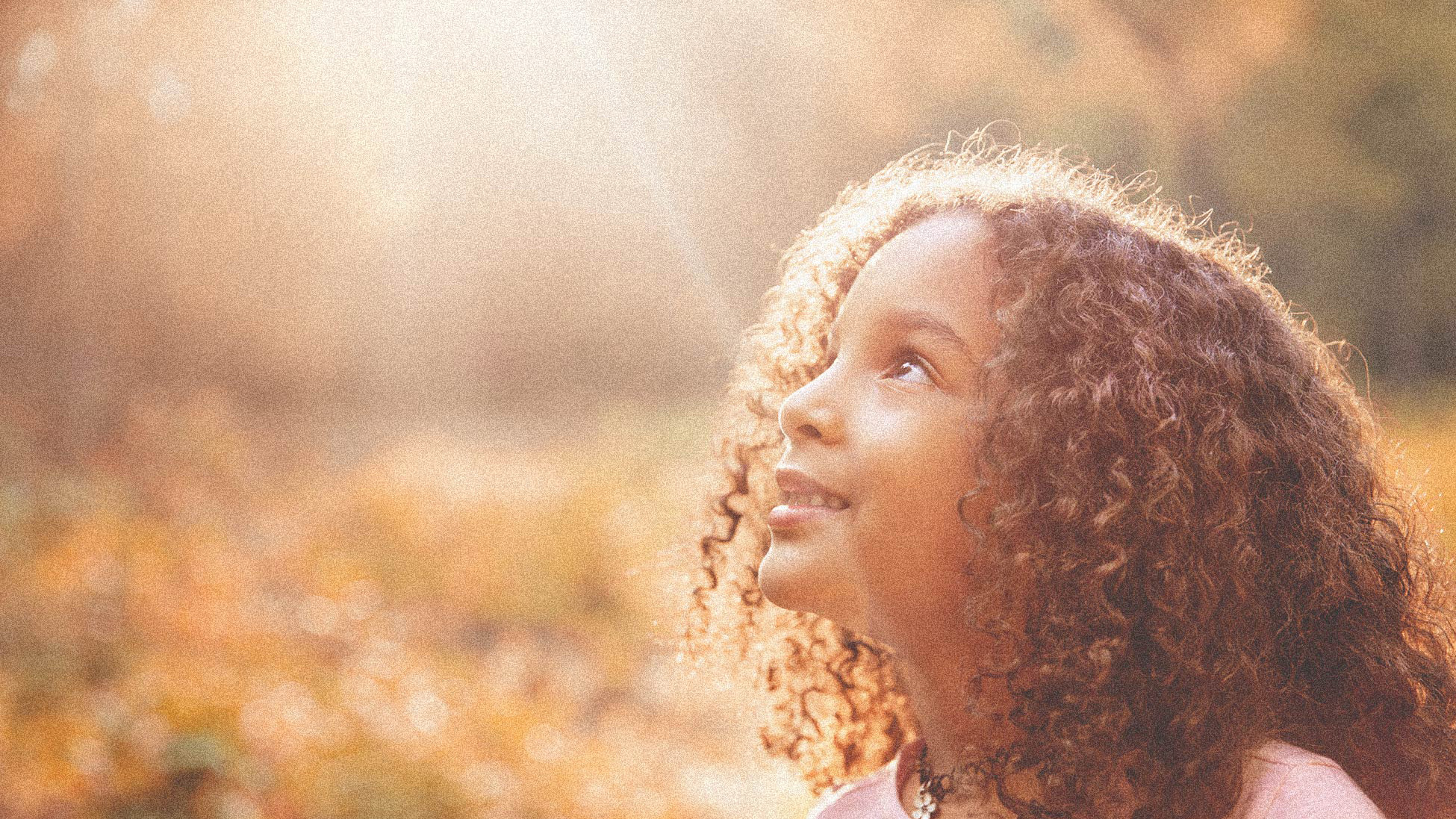 Girl looking up at the sky