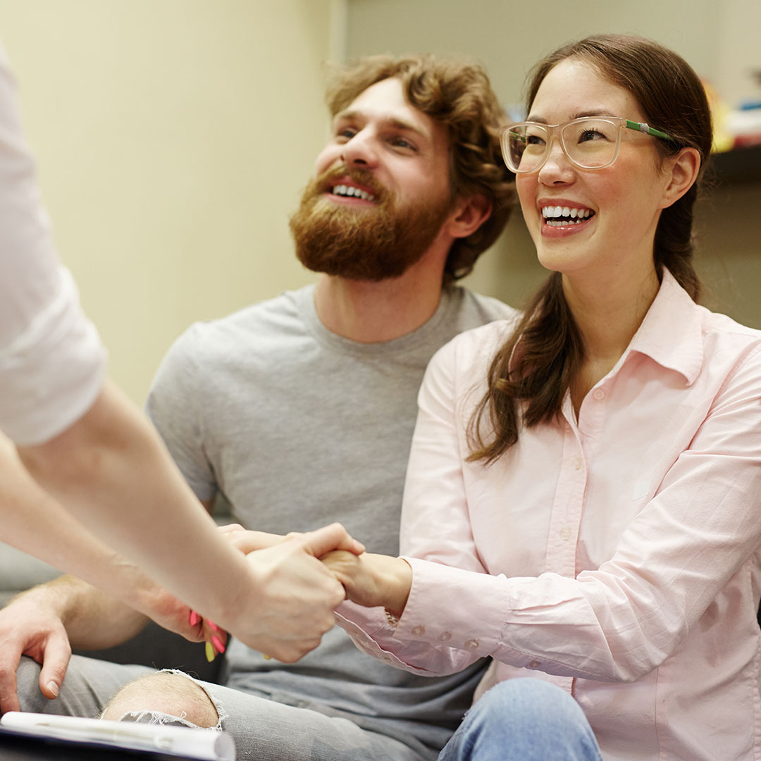 Man and woman smiling