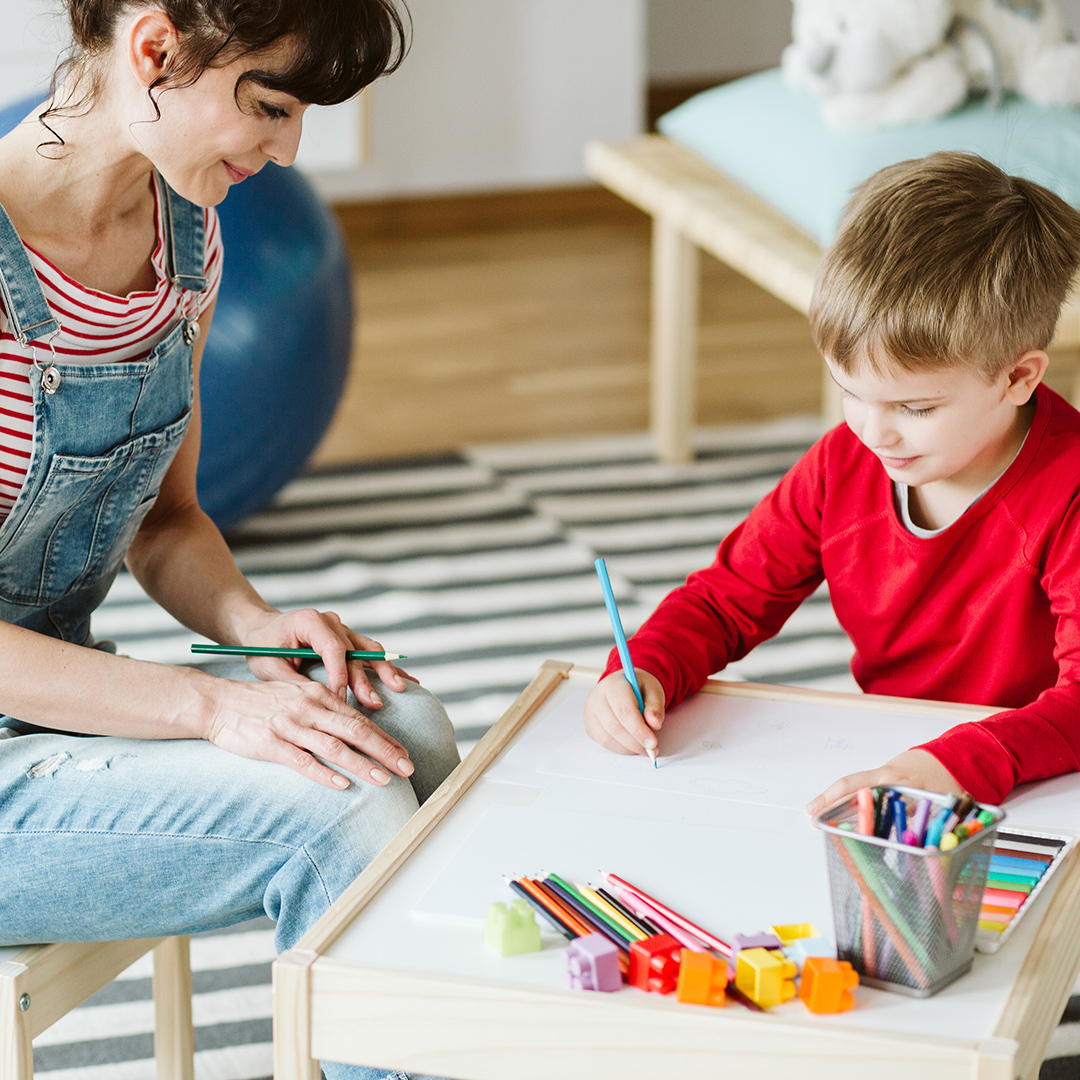 Woman and child making crafts