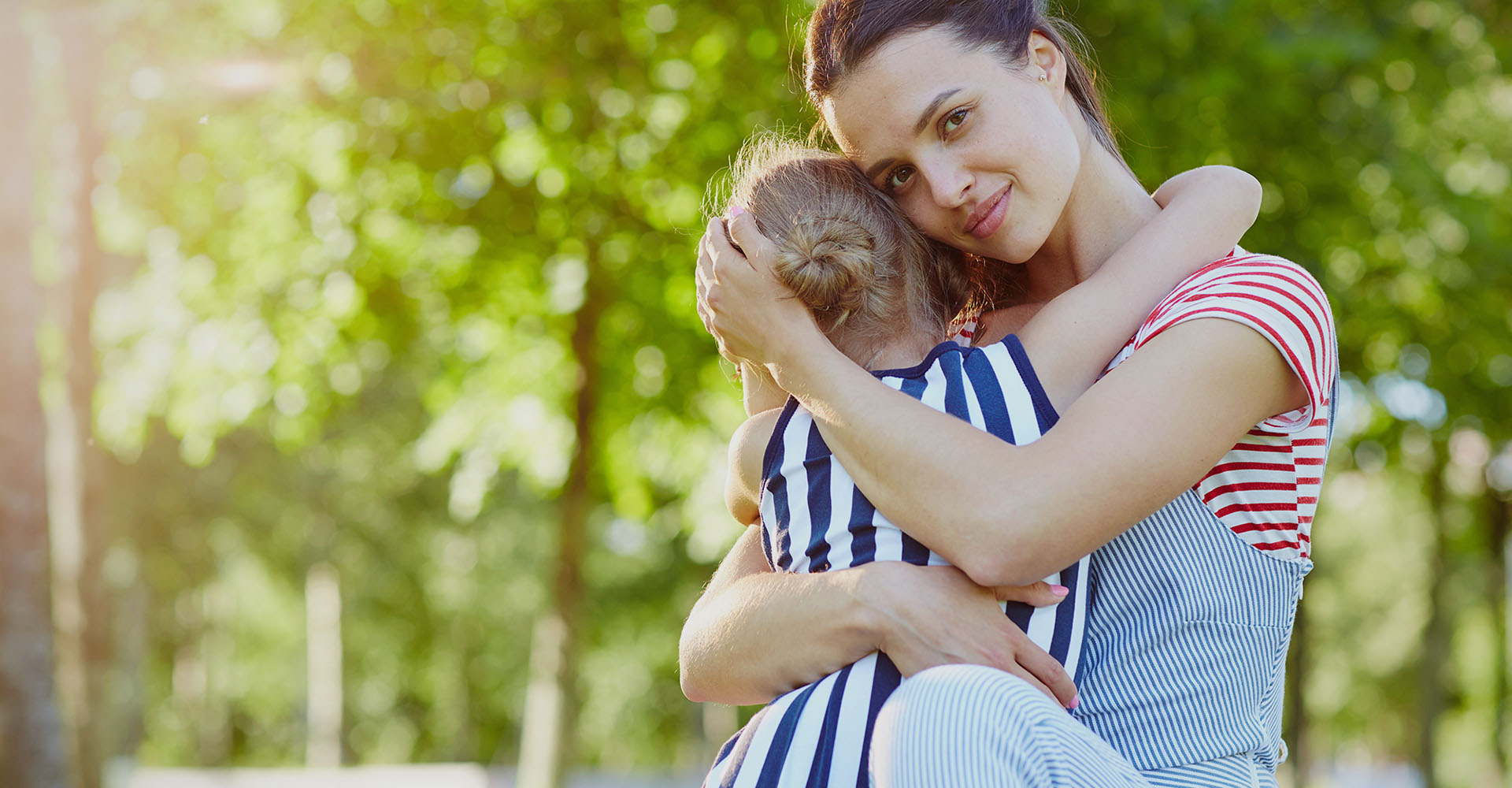 Woman holding a child