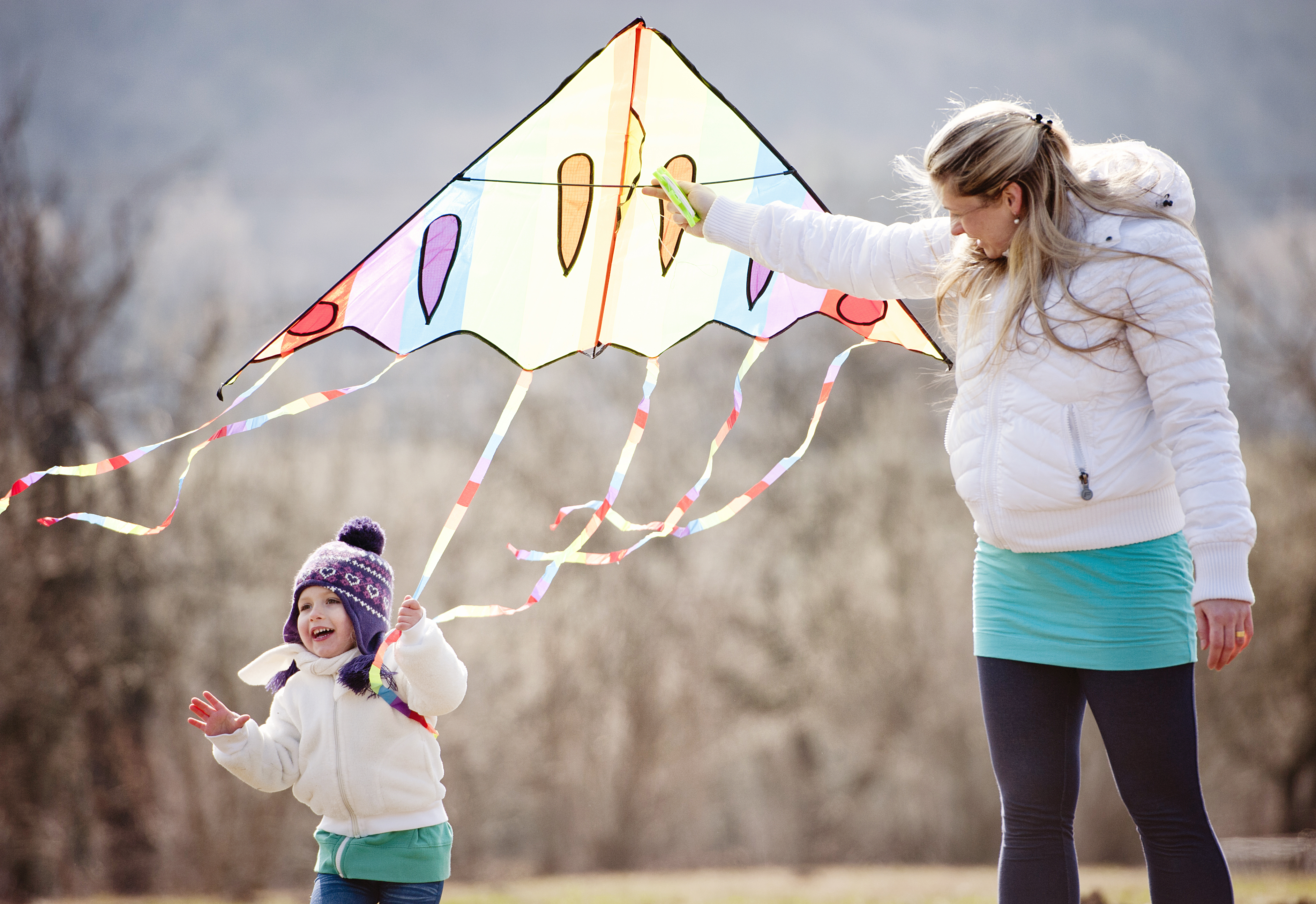 mother and child flying a kite