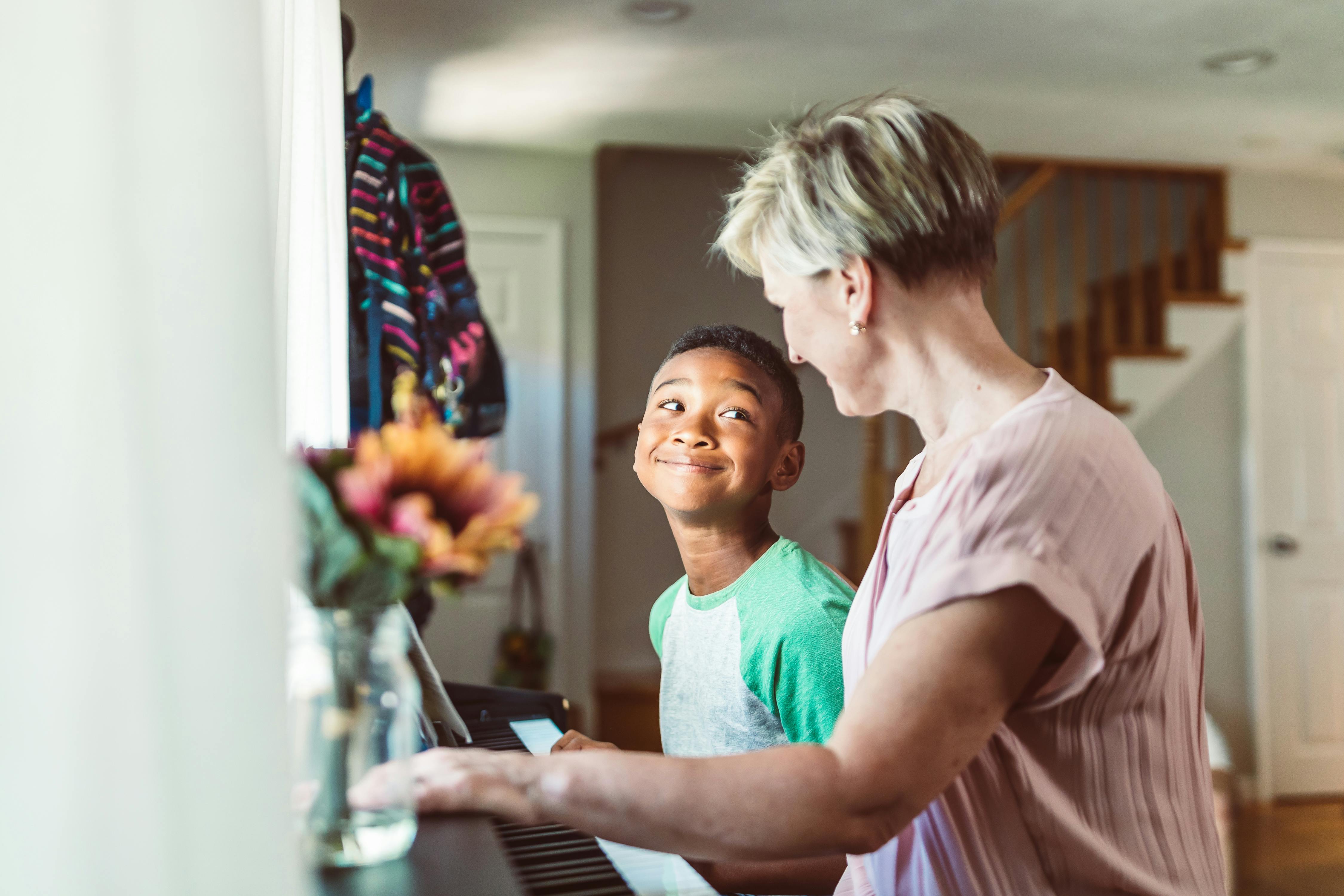woman and child at a piano