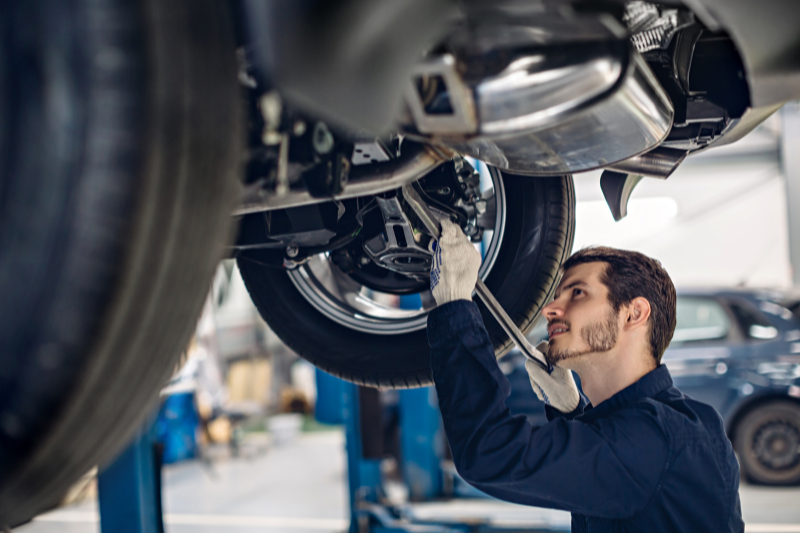 Mechanic working on a car