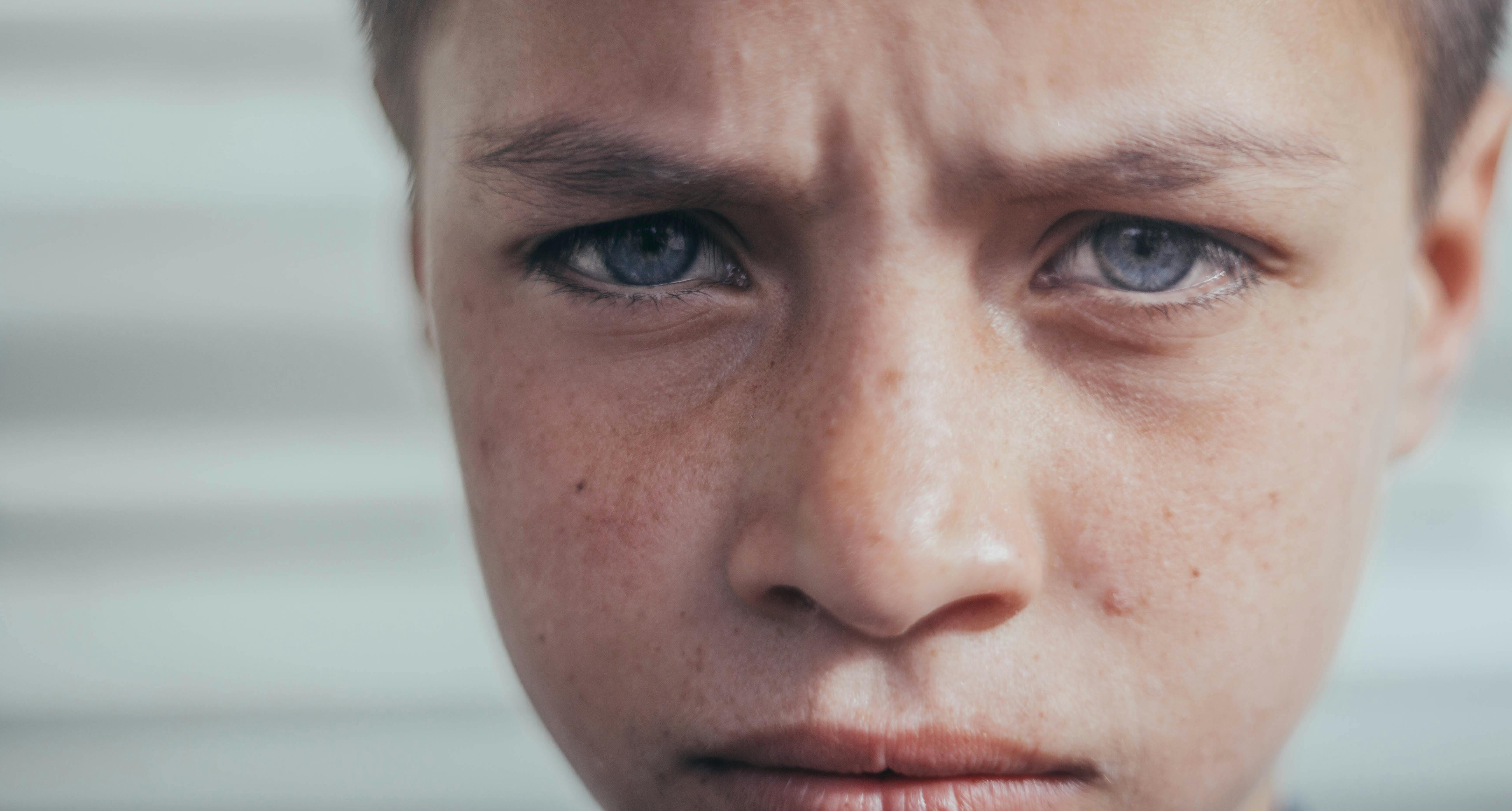 close-up of an angry young boy
