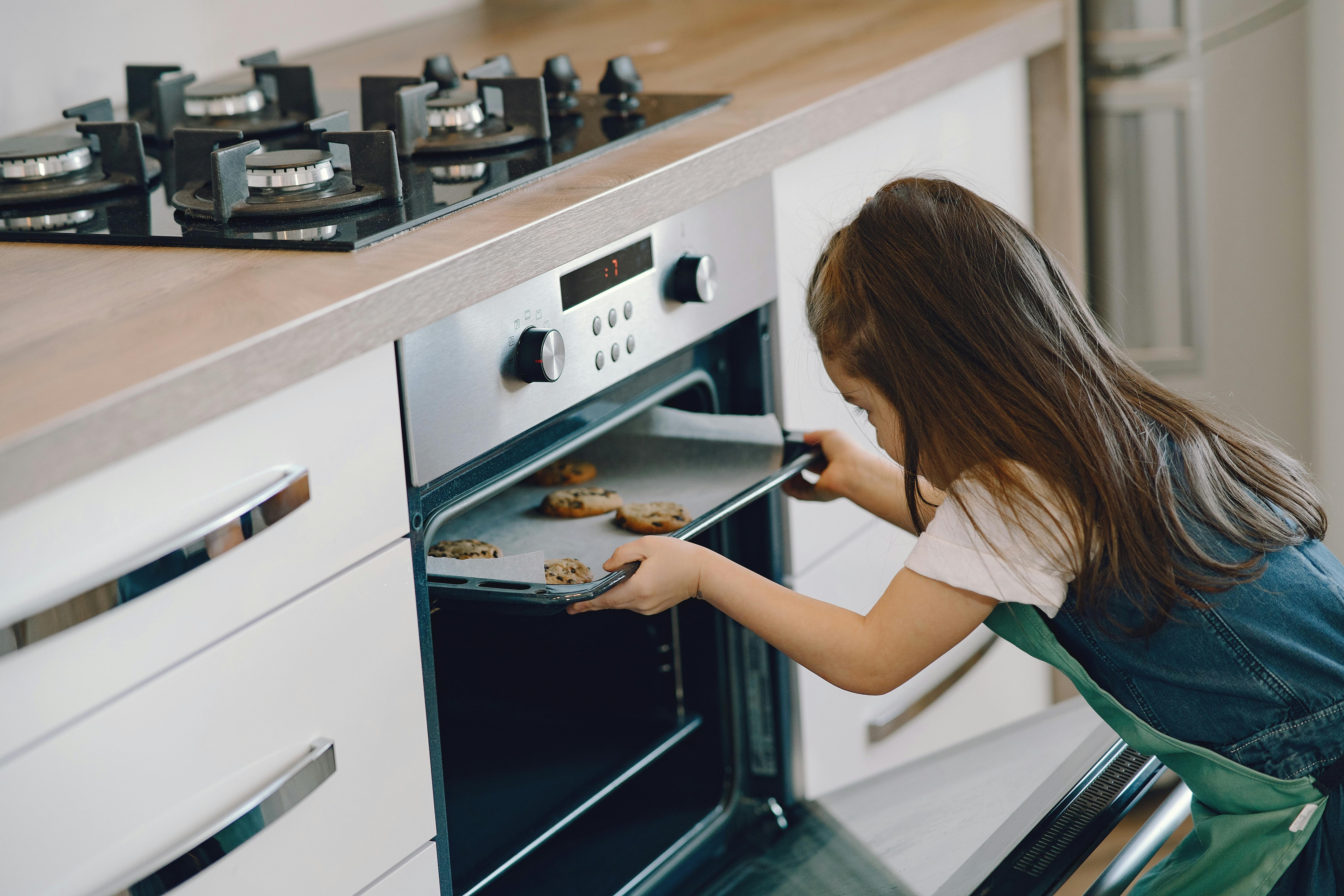 child baking cookies