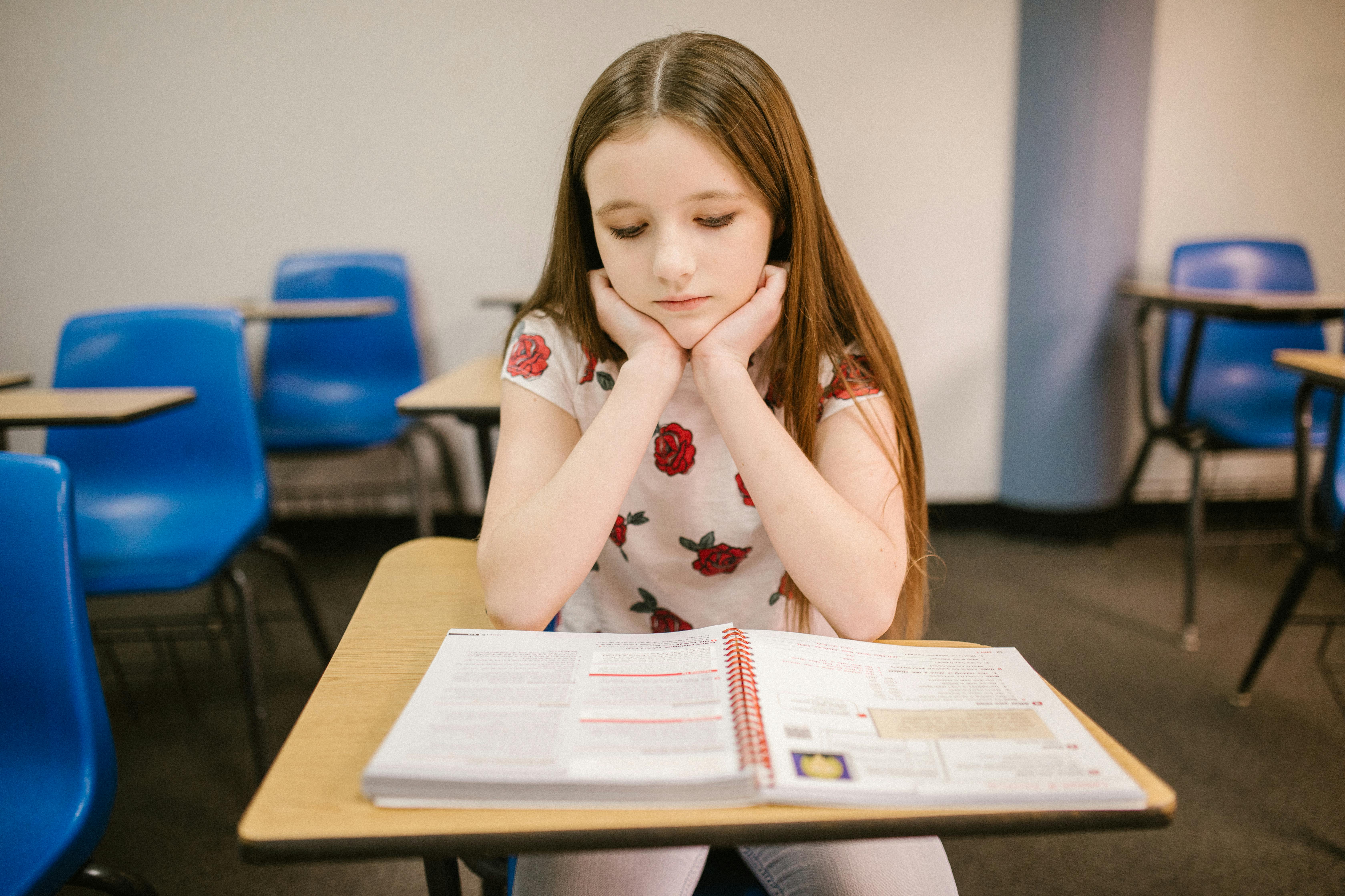 nervous female student in classroom