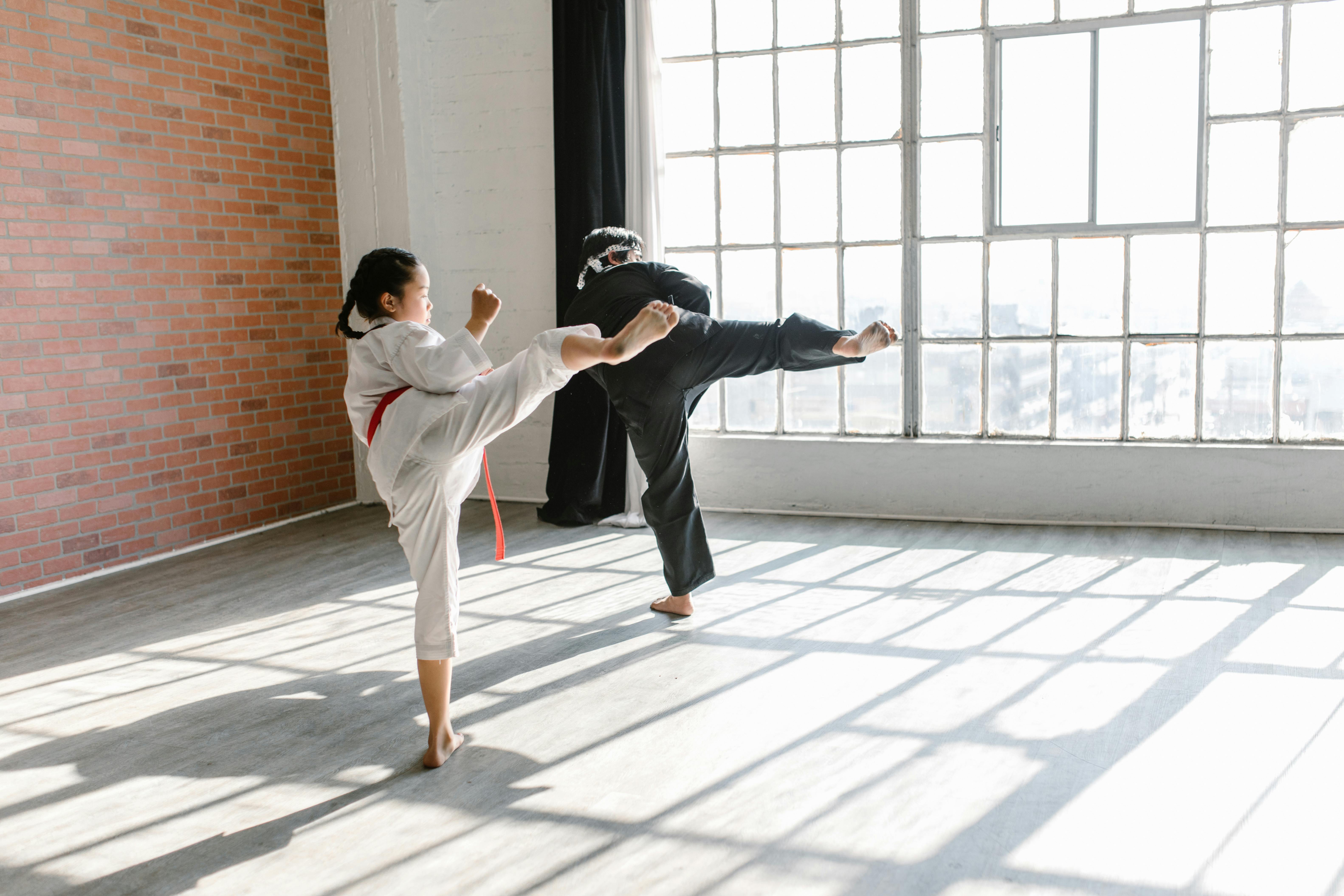 child practicing martial arts