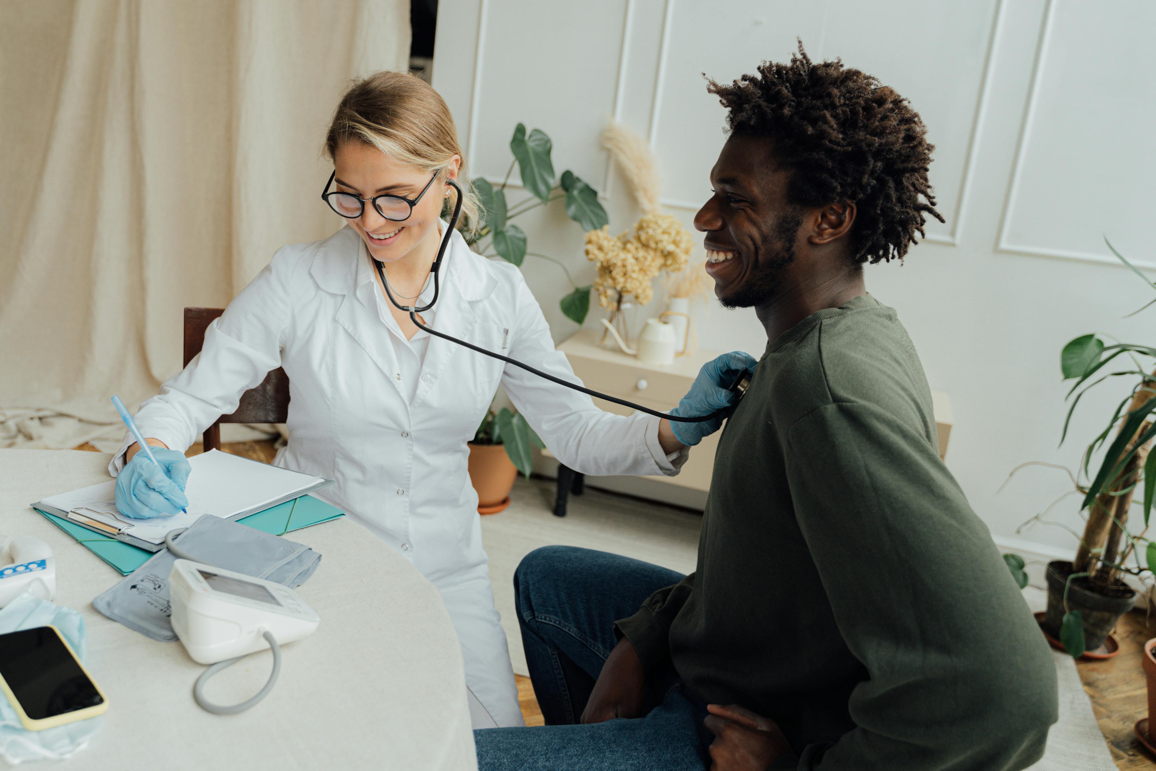 taking a patient's hearbeat