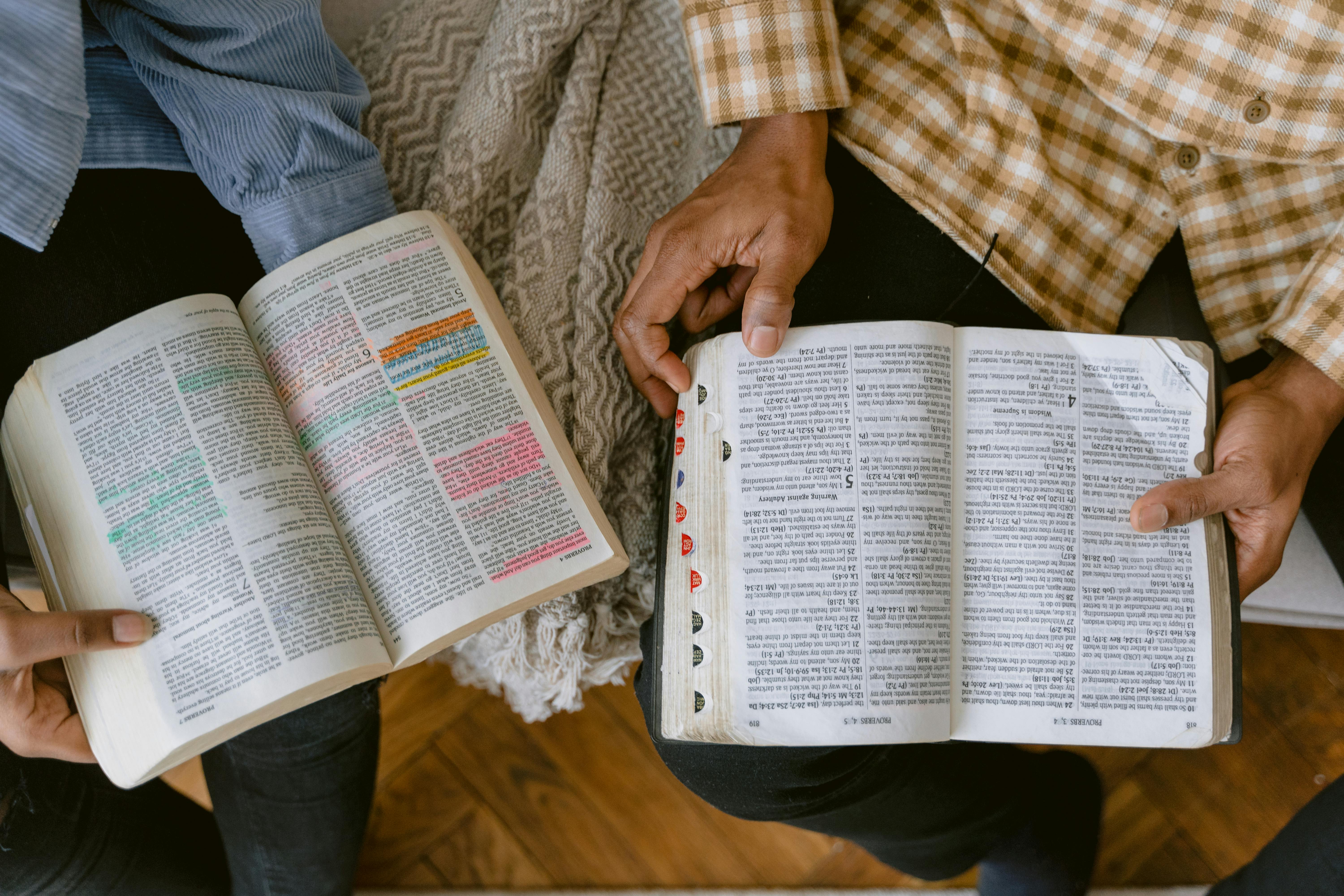 man and woman reading the Bible