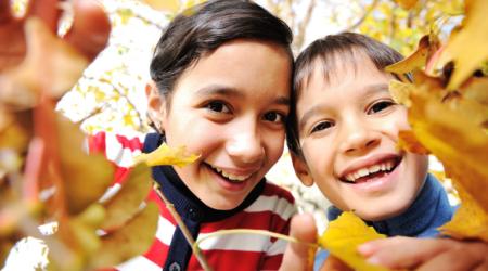 Children with leaves