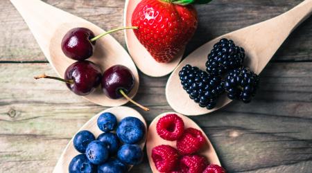 fruit on wooden spoons