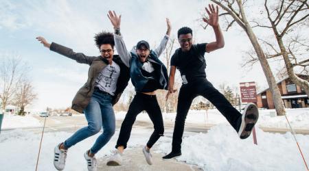 Youth jumping in snow