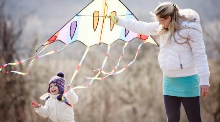 mother and child flying a kite