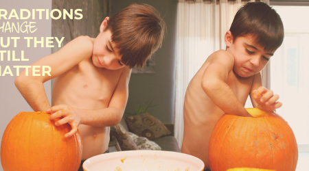 Boys carving pumpkins